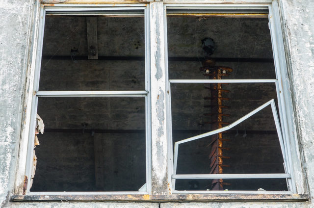 Smashed window on the exterior of the Buckner Building