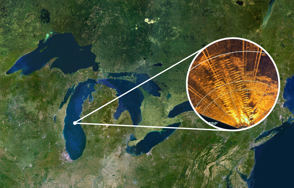 Map view of the Great Lakes, a sonar picture of a shipwreck on top.