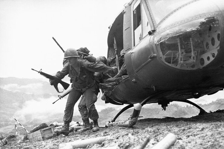 Paratroopers with the 101st Airborne Division jumping out of a helicopter