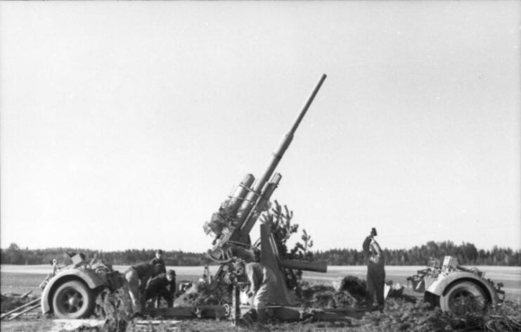 German soldiers setting up an 8.8 cm Flak 36 in the field