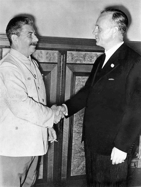 Joseph Stalin shaking hands with Joachim von Ribbentrop