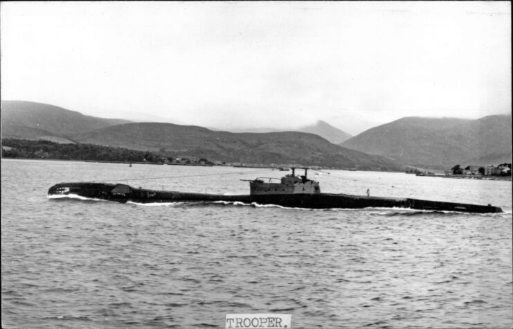 HMS Trooper (N91) surfacing while leaving port