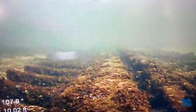 Underwater image of a shipwreck.